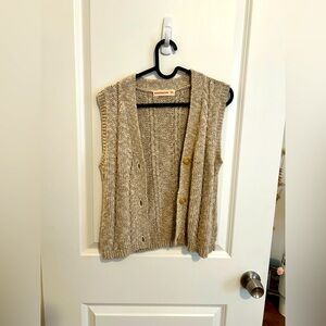 &daughter hand knitted sweater vest. No tags but never worn.
